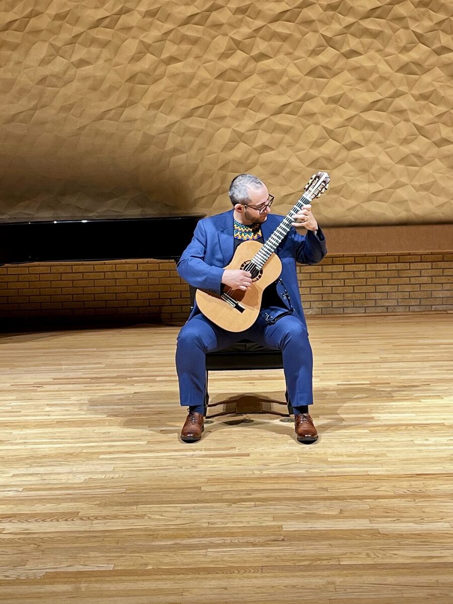 Andrés Arcila performing solo classical guitar in concert
